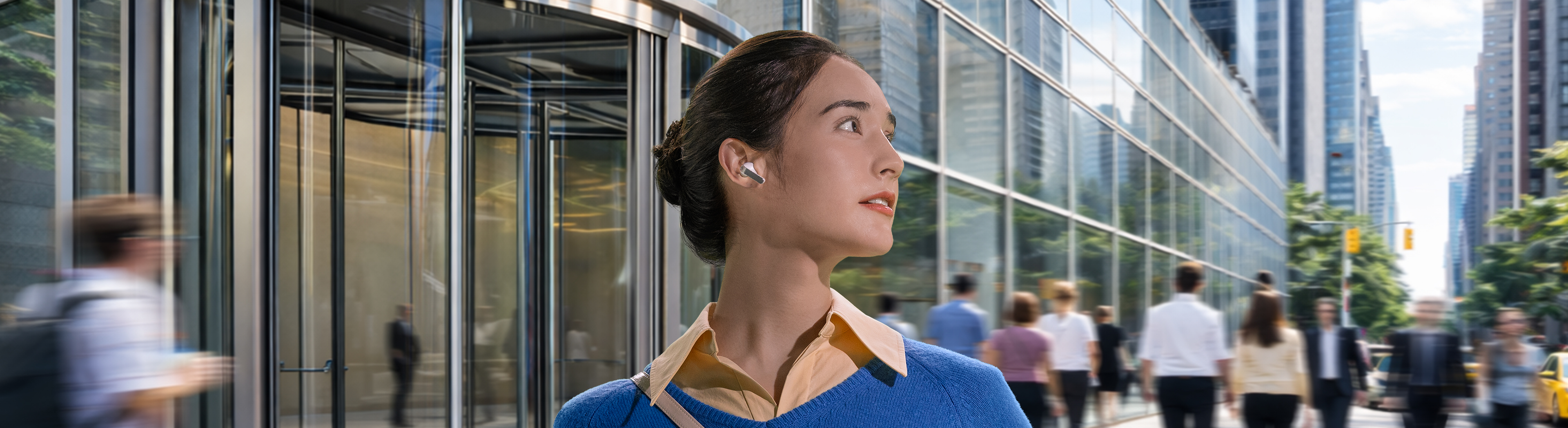 A woman with a single, white Galaxy Buds4 Pro earbud in her ear looking towards the right.